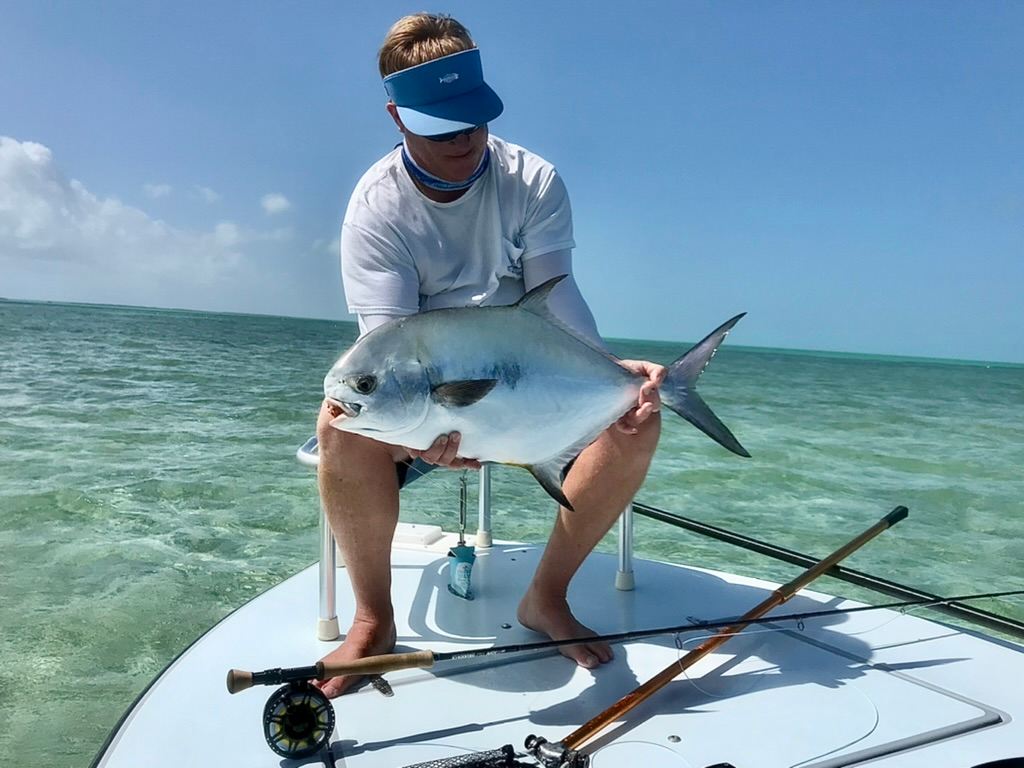 A man fly fishing for permit on a flats fishing charrter in Key West
